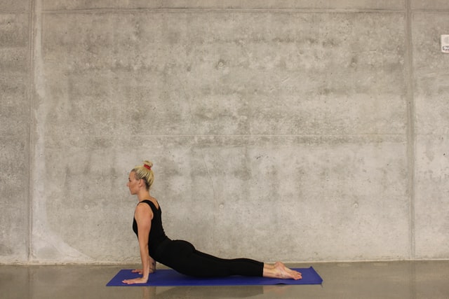 Read more about the article Prevent Back Pain With These Adjustments During Yoga + Free Video